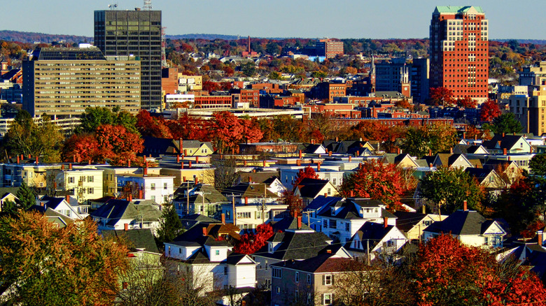 Houses and red trees throughout Manchester, New Hampshire